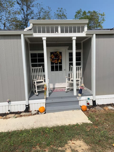 Congo Tiny House front porch relaxation.