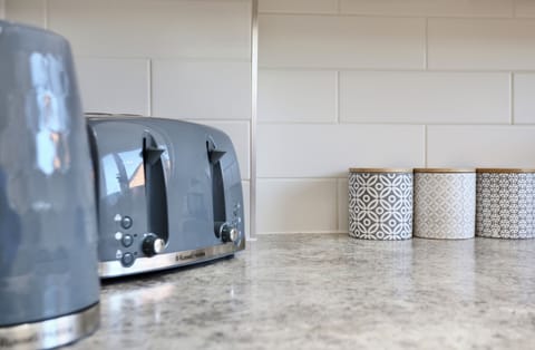 Fully equipped kitchen area on first floor