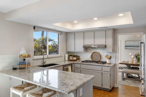Enjoy cooking in the kitchen with views of the valley, pass through window.