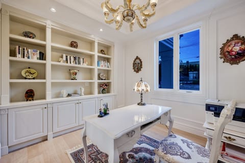 The study on the main floor overlooks the back garden