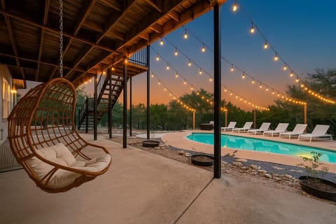 Stunning Canyon Lake views, a heated pool, cozy outdoor spaces, and endless entertainment.