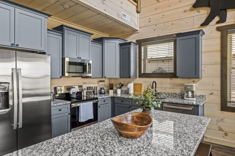 Cabin By The Creek's fully equipped kitchen
