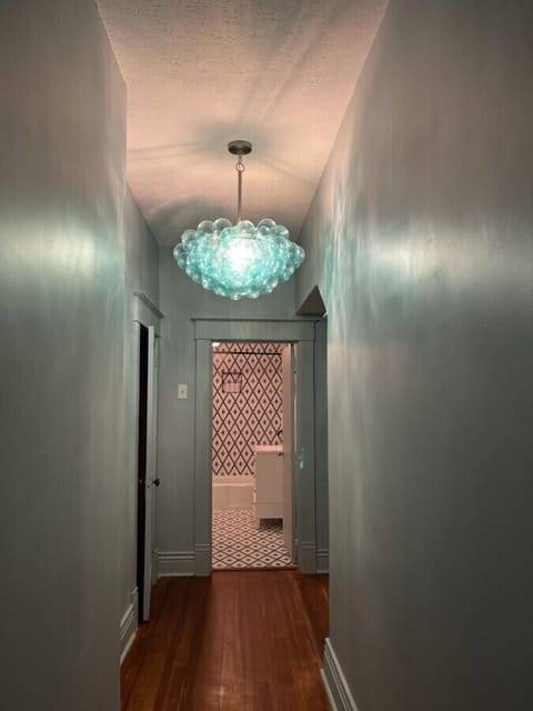 Hallway to secondary bathroom