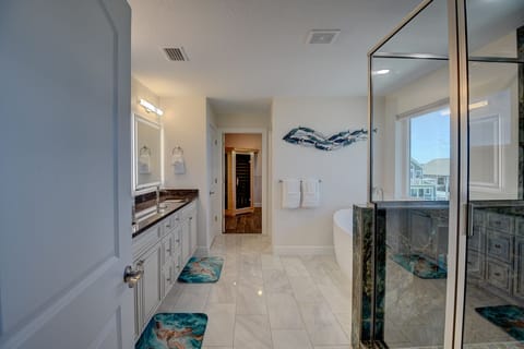 Shower, jetted tub, hair dryer, towels