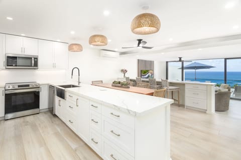 Kitchen - The kitchen has incredible ocean views and is overstocked with anything you could need to prepare incredible meals.