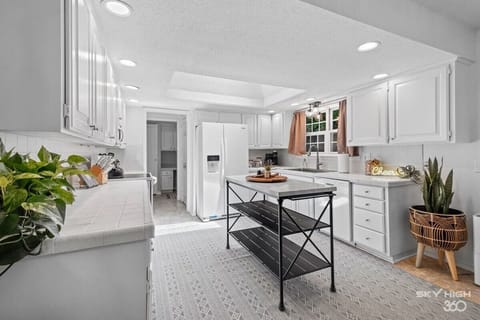 Fully stocked kitchen with ample counter space for home‑cooked meals.