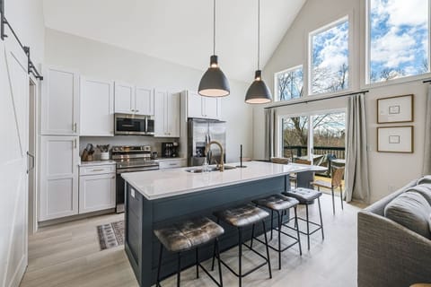 Easily prepare meals, coffee, and cocktails and walk outside to enjoy the sunrise, afternoon lunch, or evening supper