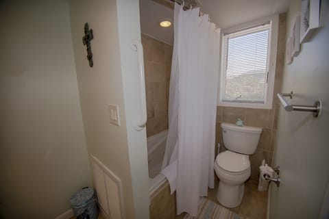 Combined shower/tub, hair dryer, towels, soap