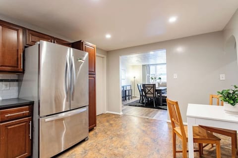 Fully equipped kitchen with modern appliances, including a stove, oven, refrigerator, microwave, and all the cookware and utensils you need to prepare your favorite meals.