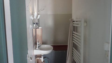 Combined shower/tub, hair dryer, towels, soap