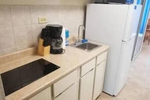 Fridge, microwave, stovetop, coffee/tea maker