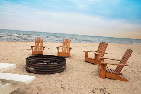 On the beach, sun loungers, beach towels