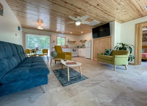 Bright and airy living space open to kitchen with plenty of room for family fun.