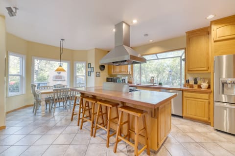 Fully equipped kitchen features stainless steel appliances.