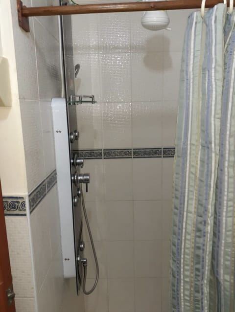 Combined shower/tub, hair dryer, towels, toilet paper