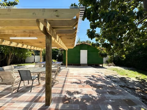 Spacious outdoor seating and dining area with tons of nature!