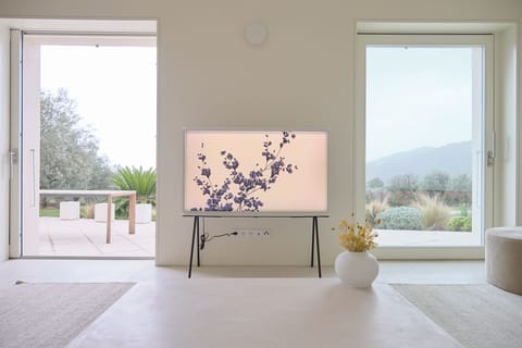 living room with sliding doors leading to outdoor terrace