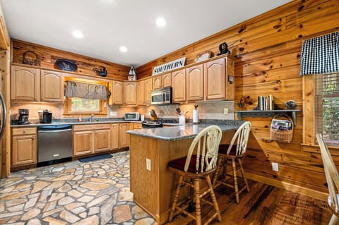 Great counter space and island in this chef's dream of a kitchen!