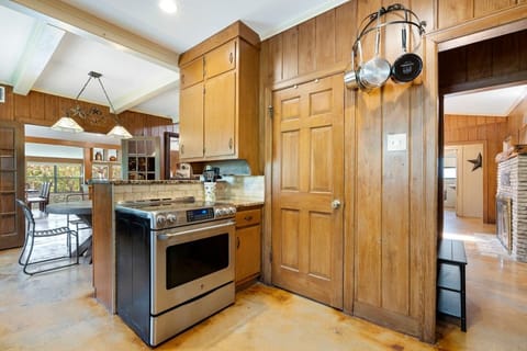 Kitchen area. Pots on wall are just a few of the total we have.
