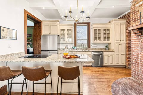 This 120-year-old home boasts modern amenities, including a kitchen equipped with all-new stainless steel appliances.