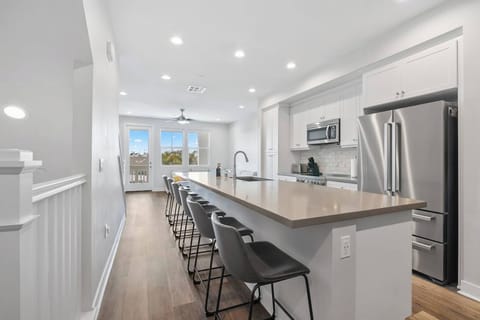 Stainless steel appliances w/large island perfect for dining and prepping