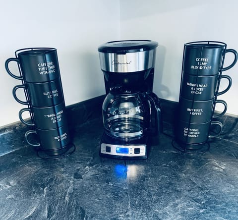 Coffee Maker and Coffee Cups. 
