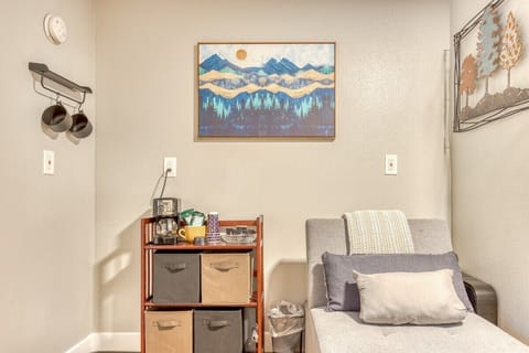 Charming corner with artistic flair, featuring functional storage/organizer