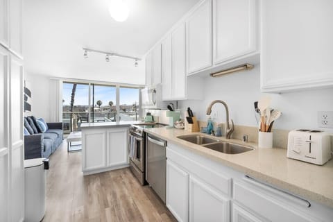 Kitchen has all essentials needed for a comfortable stay. Keurig coffee machine and coffee provided.