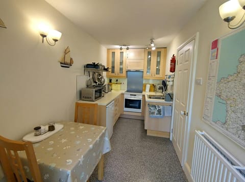 Dining area with table and two chairs