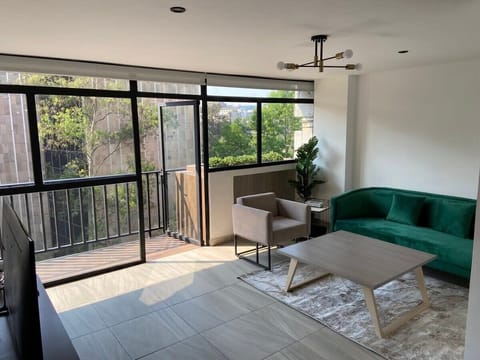 The 5th-floor apartment offers a modern, comfortable, and luminous space