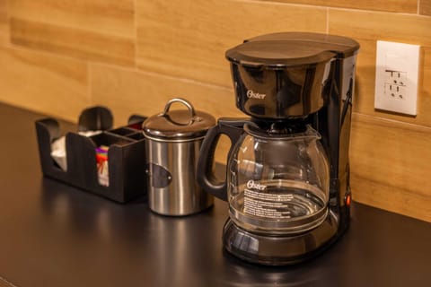 A filter coffee maker and some coffee is provided