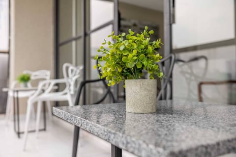 Enjoy peaceful moments on the balcony—perfect for morning coffee or evening drinks.