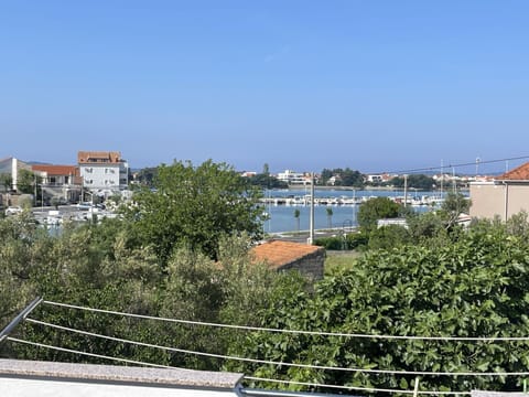 Cloud, Water, Sky, Plant, Property, Azure, Natural Landscape, Swimming Pool, Tree, Vegetation
