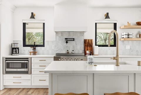 Kitchen -> Beautiful quartz countertops, Coffee maker