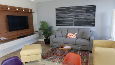 Cozy living room with vibrant seating and modern decor