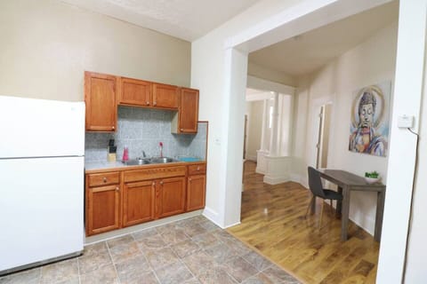 Whip up culinary delights in our sleek and fully-equipped kitchen.