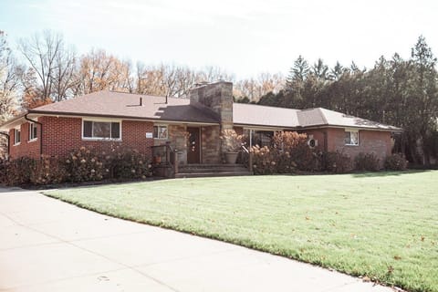 Experience a homely atmosphere with your family and friends in this spacious and beautiful house, enveloped by lush greenery, trees, and the delightful sounds of birds