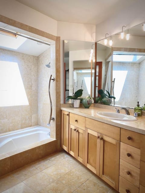 Bathtub, jetted tub, hair dryer, towels