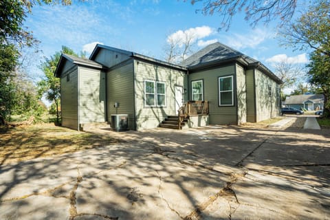 Back yard and parking. Firepit and Adirondack chairs included.