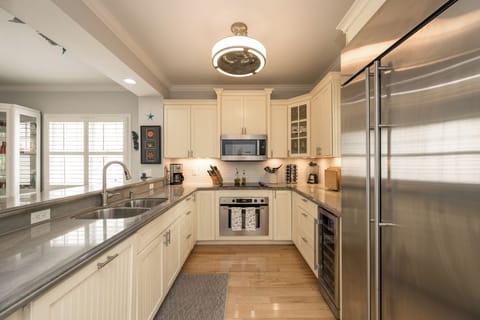 Kitchen includes 4 Burner Electric Stove with Oven