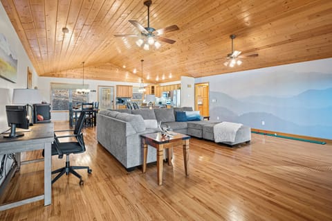 This roomy living area is made for gathering—game night, movie marathons, or just good conversation.