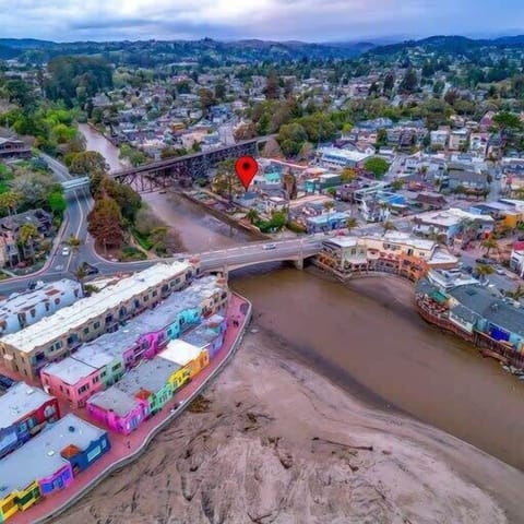 Drone view with downtown Capitola and Oceanview Oasis location.