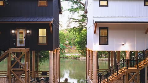Two brand-new riverfront homes on the Guadalupe, with direct float access, serene tree-lined views, and three private balconies each , perfect for relaxing and enjoying nature in comfort.