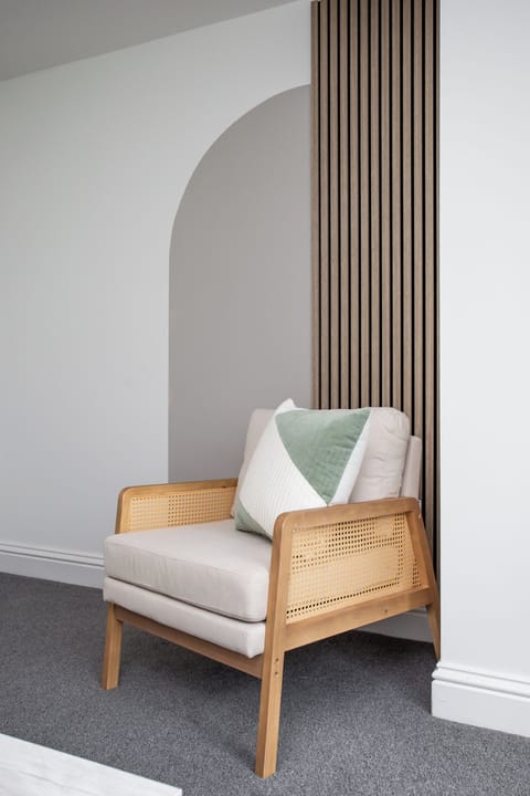 Nestled in a corner, it stands as a testament to our commitment to hospitality, providing a warm and inviting space where visitors can unwind and take in the tranquil ambiance of our home.