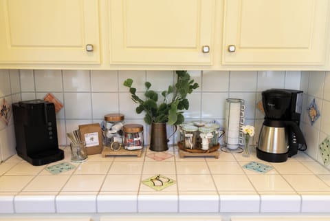 Deluxe Coffee Station! Ground coffee, Keurig pods, sugar, creamer, tea, and decafe provided.