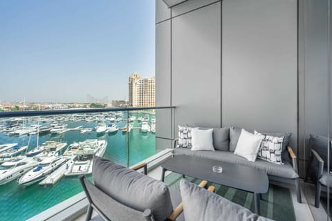 Balcony terrace dining area with panoramic sea and Atlantis views