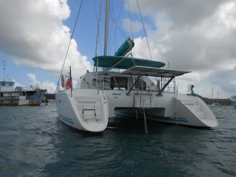 Grand Catamaran AU Mouillage Docked boat in Sainte-Anne