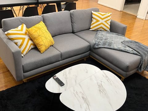 Enjoy downtime at home with a big sofa and a Smart TV