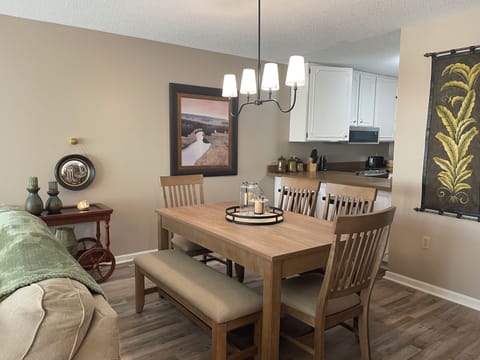 Dining room table and kitchen bar.