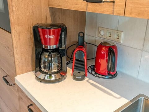 Microwave, stovetop, dishwasher, coffee/tea maker